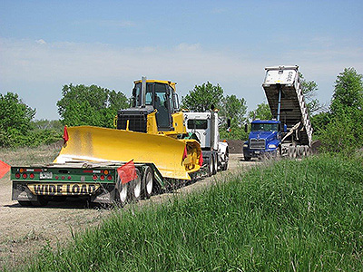 Shepley lowboy trailer and dozer